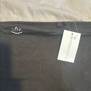 Beyond Yoga Black Infinity scarf with zip pocket.